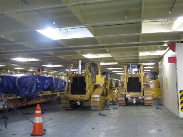 HBXG bulldozers being loaded onto cargo ship for export