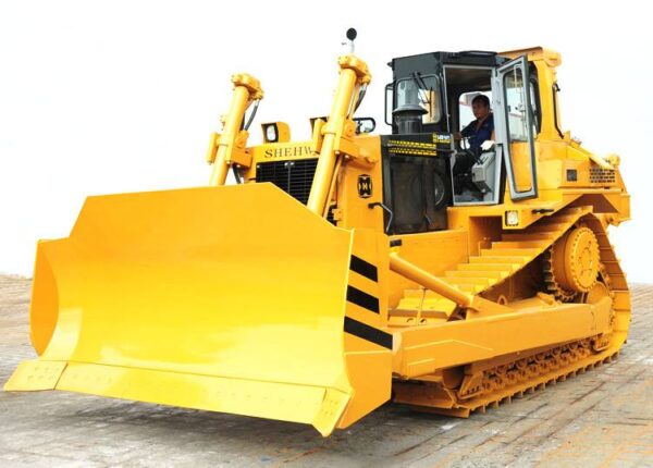 Yellow HBXG SD7 dozer with operator in cab on site